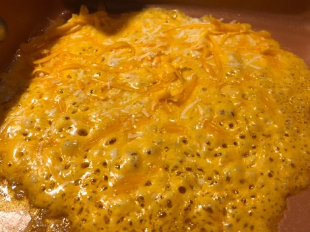melted cheese on pan
