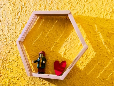 Honeycomb Shadow Shelf - shelf on wall with two items displayed