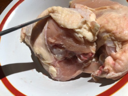 lifting skin on chicken breasts