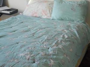 Tufting a Comforter - tufted comforter on bed