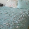 Tufting a Comforter - tufted comforter on bed