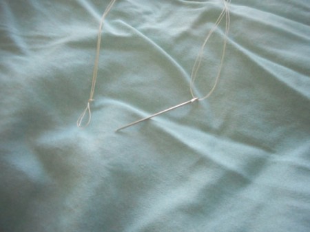Tufting a Comforter - thread needle with double thread