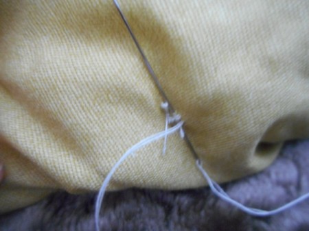 Tufting a Comforter - tie off thread on underside