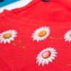 Red t-shirt painted with small daisies.