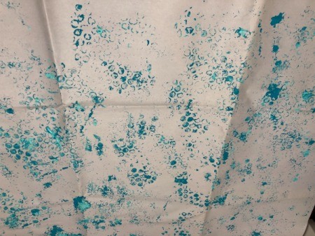 Wrapping Paper and Bow Made from Packaging Items - stamp