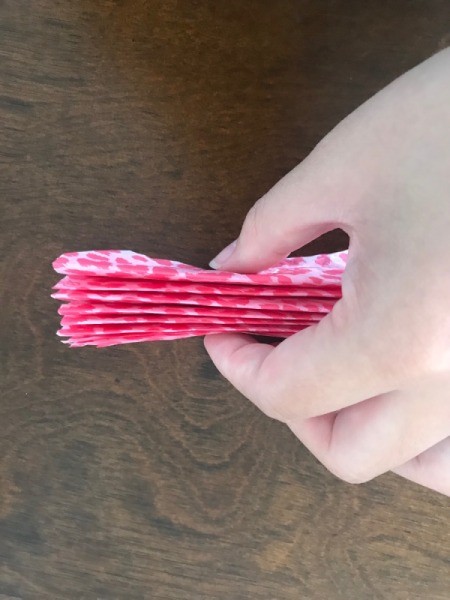 Wrapping Paper and Bow Made from Packaging Items - pinch center