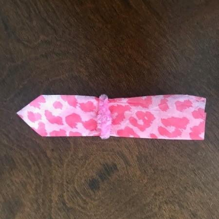 Wrapping Paper and Bow Made from Packaging Items - trim ends to desired shape