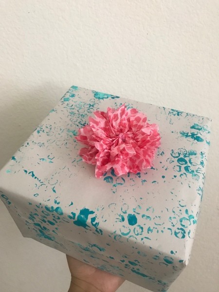 Wrapping Paper and Bow Made from Packaging Items - wrapped gift