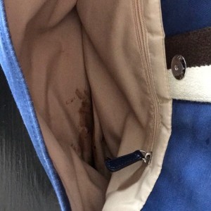 Cleaning a Chocolate Stain Off a Coach Messenger Bag - stain inside pocket
