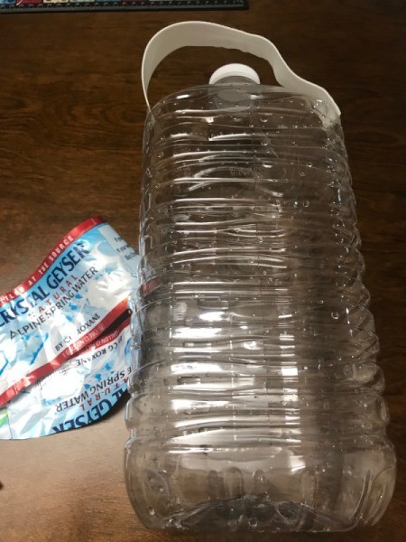 Upcycled Water Jug Gift Basket - remove the label