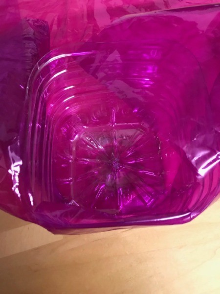 Upcycled Water Jug Gift Basket - pulling in sides of paper