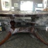 Value of a Mersman Coffee Table - plastic wrapped oval coffee table