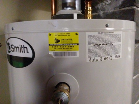 Date of installation written on hot water heater.