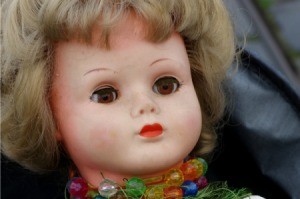 face off porcelain doll