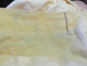 Black Dye Transferred onto Yellow Shorts
