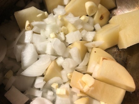 cut potatoes, onions and garlic