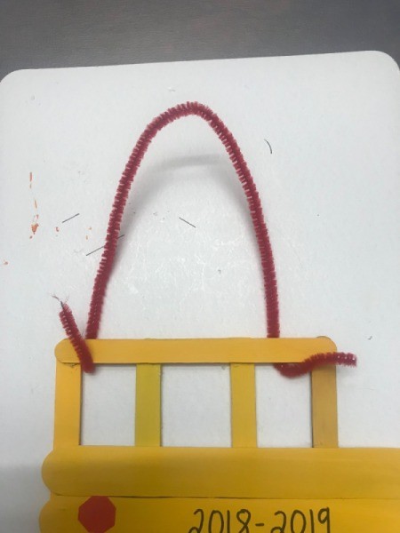 Hanging School Bus Picture Frame - twist the pipe cleaner through the windows