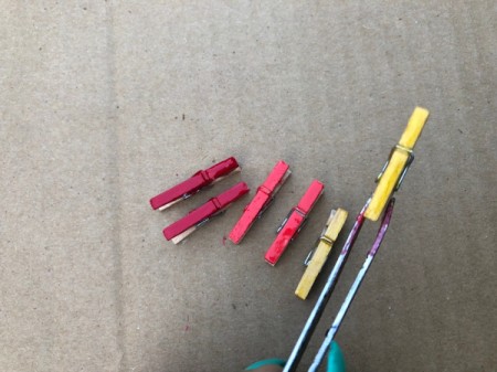 Mini Clothespin Rainbow Necklace - tweezers help you hold the pins while painting