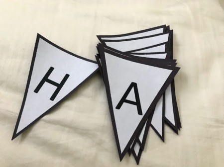 Happy Birthday Printable Banner - stack of triangles with construction paper backing