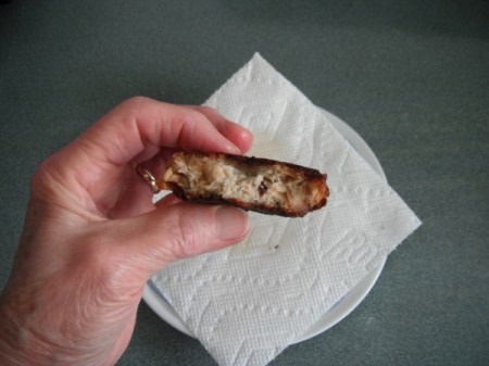 side view of eating Salmon Cake