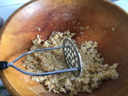 smashing white beans