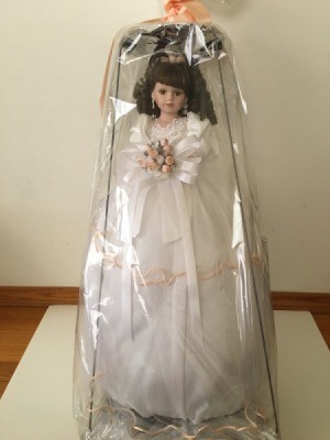 Identifying a Porcelain Doll - doll in plastic protective bag