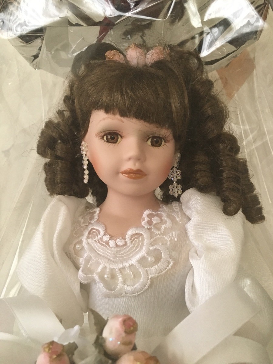 porcelain doll with teeth