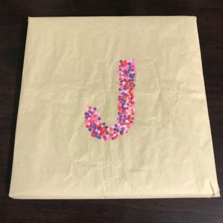 Personalized Initial Confetti Gift Wrap Paper - the initial decoration is done