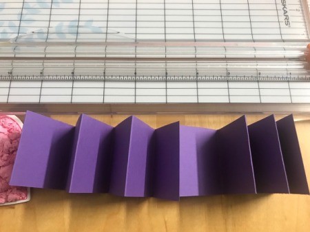 Upcycled Coupon to Birthday Card - fold the paper accordion style