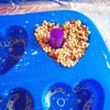 Bird Seed Heart Wedding Favors - press cut straws into the center of the seed heart