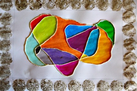 Colorful Doodle Monster - use the sponge and brown paint to stamp a frame around the edge