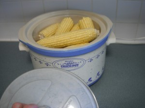 6 ears of raw corn in a crockpot.