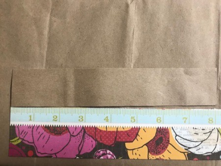 Simple Tassel Bow Gift Topper - cut a paper strip for the bow, measuring the length