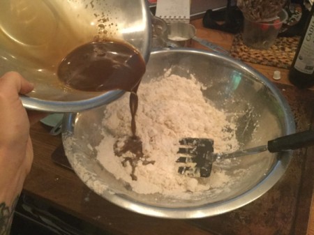adding yeast mixtureto flour