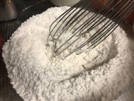 whisking flour, baking powder and salt