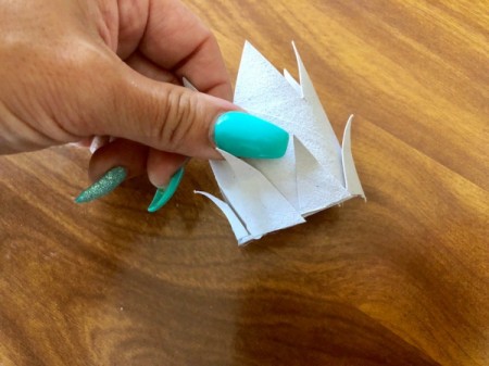 Cardboard Tube Crowns - glue some of the triangles to the base of another and curl tips out