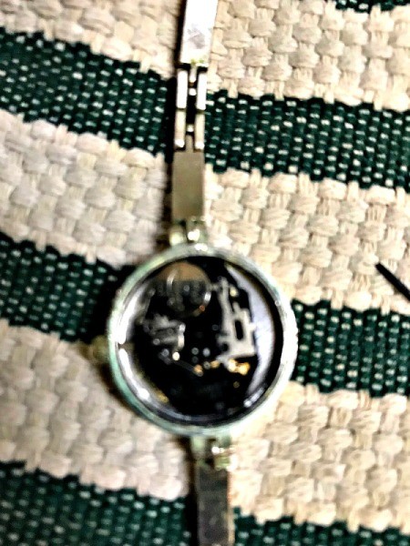 Replacing Your Watch Battery - remove the plastic covering the battery