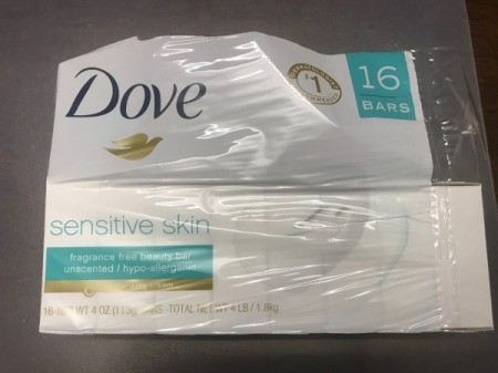 A plastic wrapper from a package of Dove bar soap.