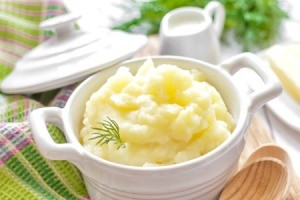 Bowl of creamy mashed potatoes.