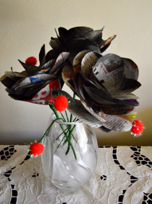 Bunch of Newspaper Roses - vase filled with roses and pom poms