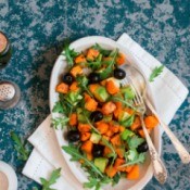 Sweet Potato Salad with avocado, olives and greens.