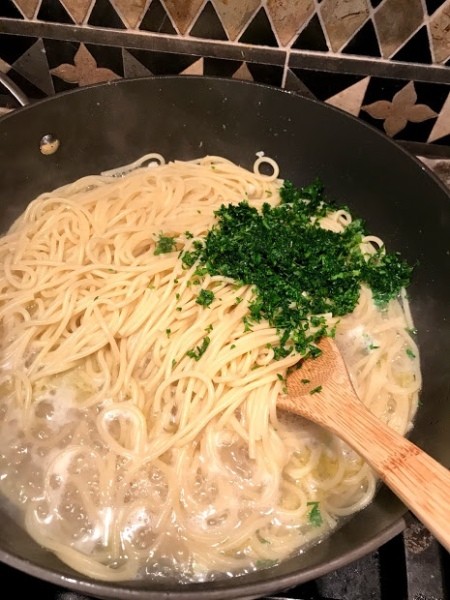 chopped parsley on noodles
