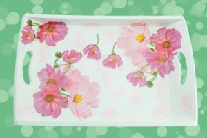 Decoupaged tray with flowers.