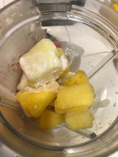 pineapple and coconut milk in blender