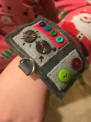 Felt Wrist Control Panel - control panel on child's wrist