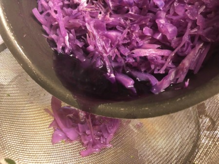 DIY Organic Food Colouring - pouring through a strainer