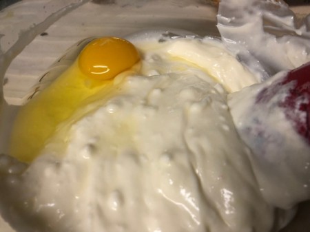 adding egg to filling