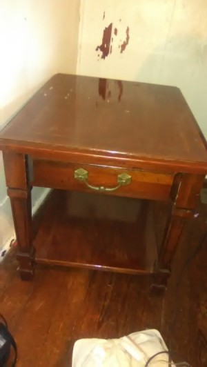 Value of a Mersman End Table - medium wood finish end table with drawer