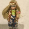 Identifying a Porcelain Doll - doll in classic hippy attire