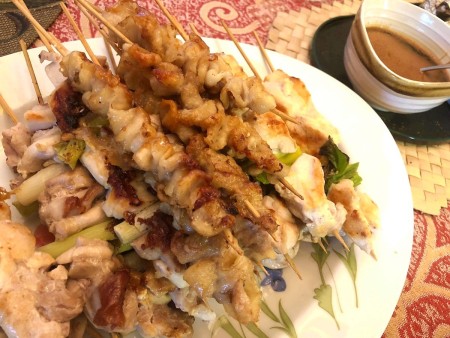 cooked skewered chicken